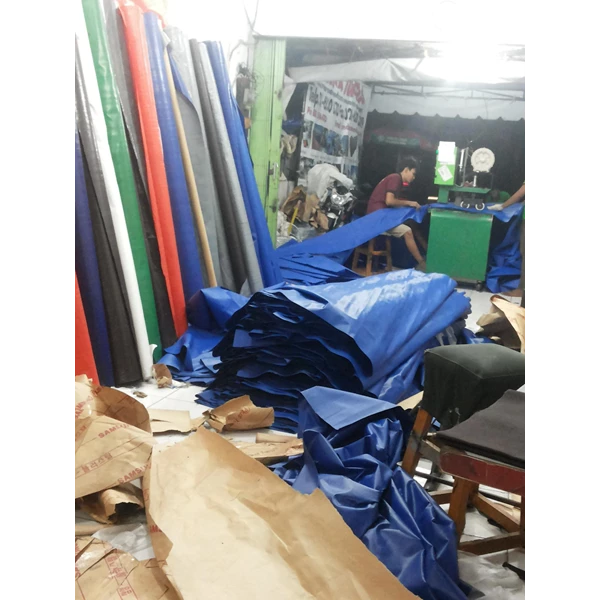 production of tarpaulin plastic sheeting for tents